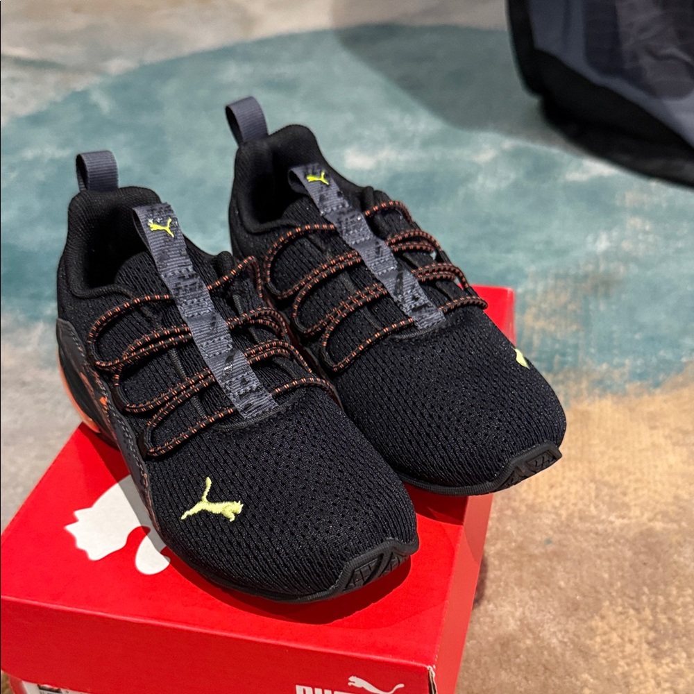 Puma Kids Black Sneakers with Yellow Highlights